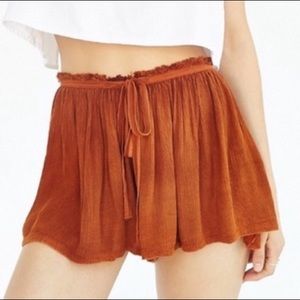 Orange Urban Outfitters shorts